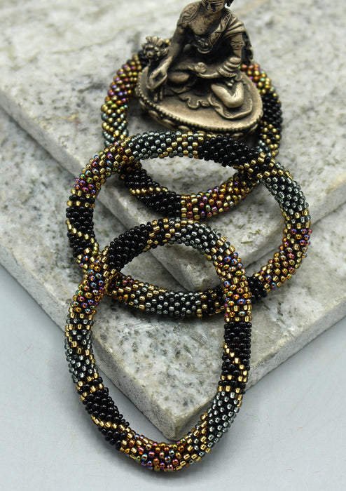 Shiny Gold, Black & Mixed Color Beads Nepalese Roll on Bracelet