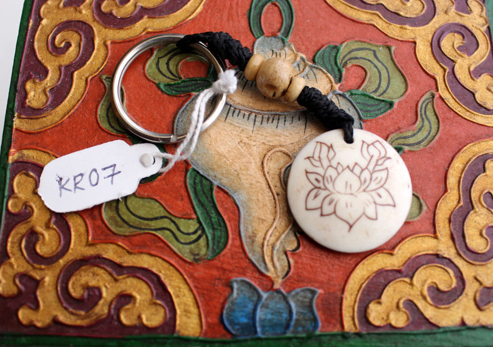 Round Shape Hand Carved Key Chain From Nepal - nepacrafts