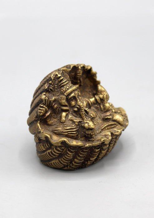 Engraved Brass Ganesha on Conch - nepacrafts