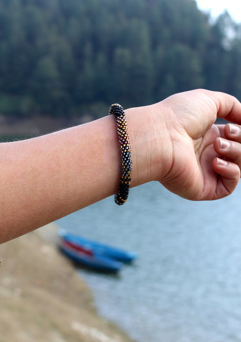 Shiny Gold, Black & Mixed Color Beads Nepalese Roll on Bracelet