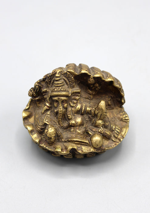 Engraved Brass Ganesha on Conch - nepacrafts