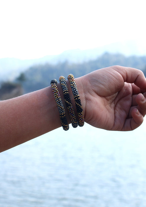 Shiny Gold, Black & Mixed Color Beads Nepalese Roll on Bracelet