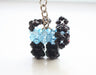 Sky Blue and Black Small Puppy Clear Resin Crystal Key Chain - nepacrafts